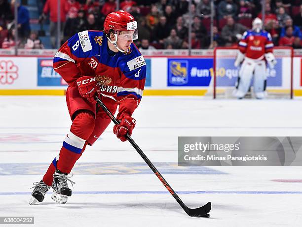 Kirill Urakov of Team Russia skates the puck during the 2017 IIHF World Junior Championship semifinal game against Team United States at the Bell...