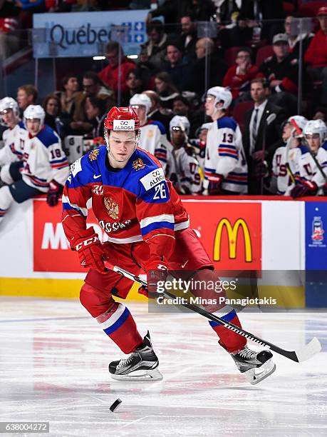 Mikhail Sergachev of Team Russia looks to play the puck during the 2017 IIHF World Junior Championship semifinal game against Team United States at...