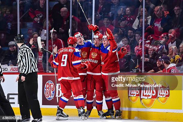 Team Russia celebrate a goal during the 2017 IIHF World Junior Championship semifinal game against Team United States at the Bell Centre on January...