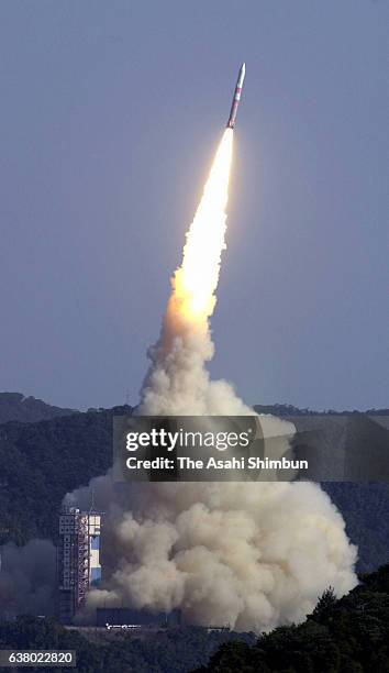 Uchinoura, JAPAN Japan's Institute of Space and Astronautical Science M-V-4 rocket carrying the X-ray astronomy satellite 'ASTRO-E' lifts off from...