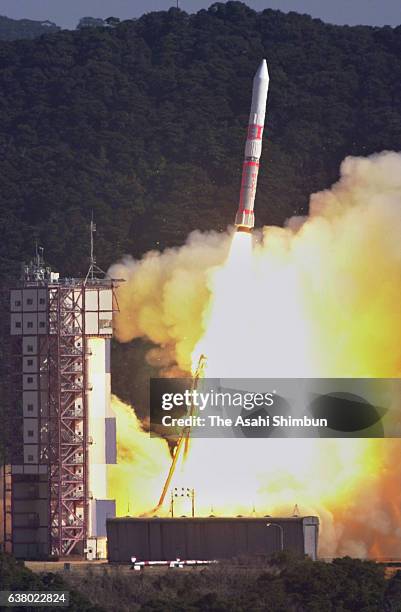 Uchinoura, JAPAN Japan's Institute of Space and Astronautical Science M-V-4 rocket carrying the X-ray astronomy satellite 'ASTRO-E' lifts off from...