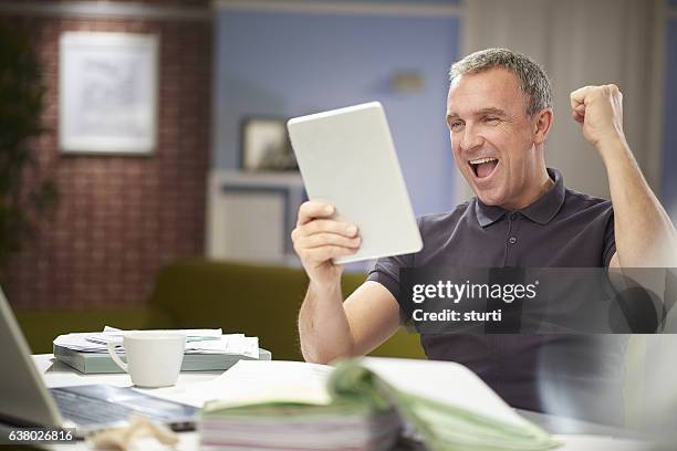 great online quote - punching the air stock pictures, royalty-free photos & images