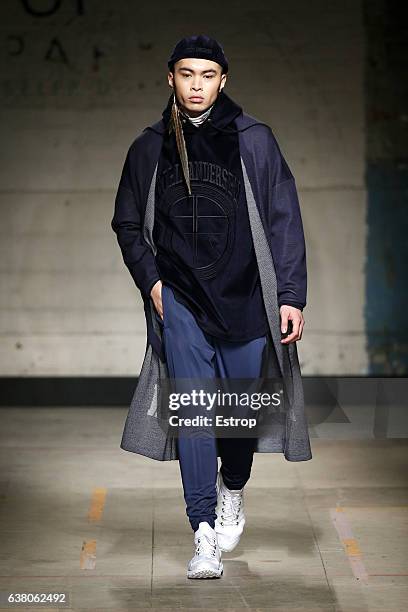 Model walks the runway at the Astrid Andersen show during London Fashion Week Men's January 2017 collections at BFC Show Space on January 7, 2017 in...