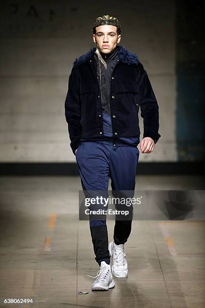 Model walks the runway at the Astrid Andersen show during London Fashion Week Men's January 2017 collections at BFC Show Space on January 7, 2017 in...