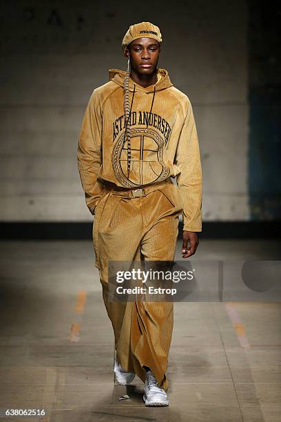 Model walks the runway at the Astrid Andersen show during London Fashion Week Men's January 2017 collections at BFC Show Space on January 7, 2017 in...