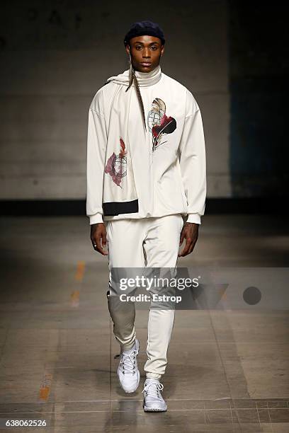 Model walks the runway at the Astrid Andersen show during London Fashion Week Men's January 2017 collections at BFC Show Space on January 7, 2017 in...