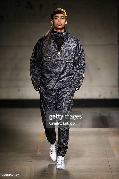 Model walks the runway at the Astrid Andersen show during London Fashion Week Men's January 2017 collections at BFC Show Space on January 7, 2017 in...