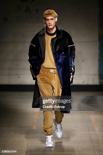 Model walks the runway at the Astrid Andersen show during London Fashion Week Men's January 2017 collections at BFC Show Space on January 7, 2017 in...