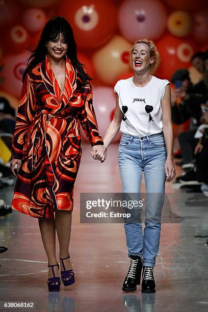 Designer Katie Eary with Daisy Lowe walks the runway at the Katie Eary show during London Fashion Week Men's January 2017 collections at BFC Show...