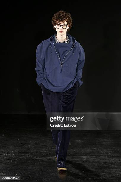 Model walks the runway at the E.Tautz designed by Patrick Grant show during London Fashion Week Men's January 2017 collections at BFC Show Space on...