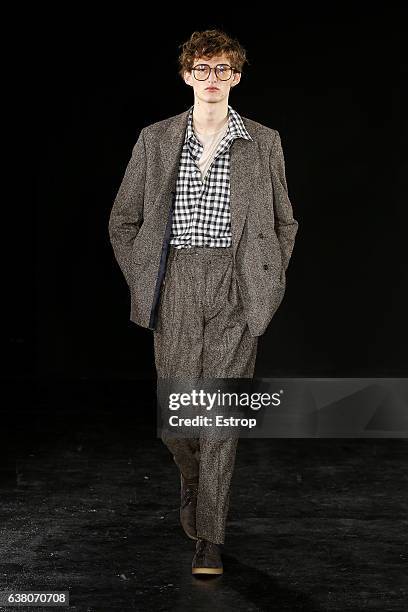 Model walks the runway at the E.Tautz designed by Patrick Grant show during London Fashion Week Men's January 2017 collections at BFC Show Space on...