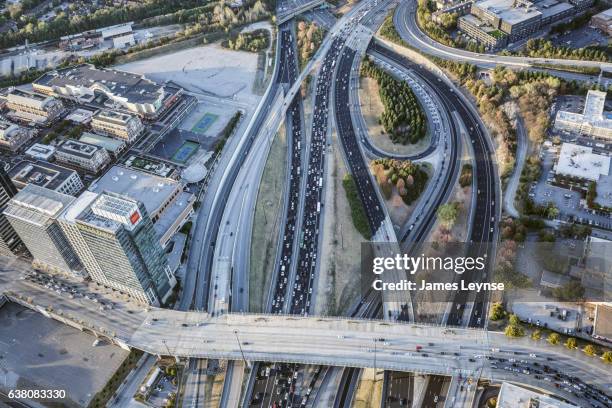 aerial view of traffic in atlanta at rush hour. - atlanta traffic stock pictures, royalty-free photos & images