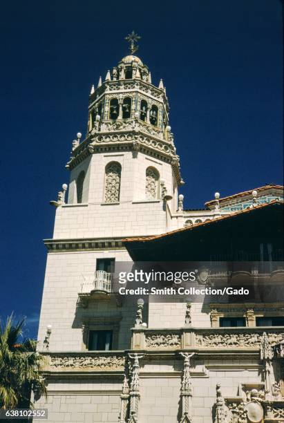 Tower rises from the ornately designed exterior of the entrance to Hearst Castle, San Simeon, California, 1960. .