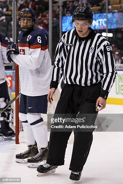 Defenseman Martin Fehervary of Team Slovakia gives a look at the official after disagreeing with a call that was made in a preliminary round - Group...