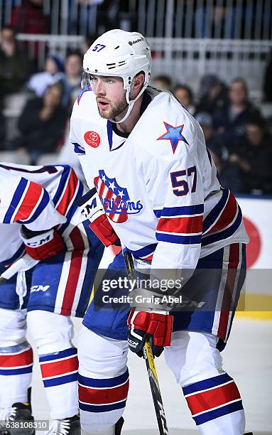 Brady Austin of the Rochester Americans prepares for a face-off against the Toronto Marlies during AHL game action on January 8, 2017 at Ricoh...