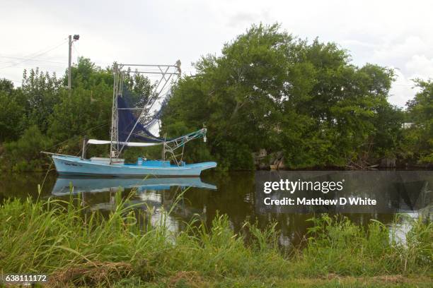 boat in bayou, pointe aux chenes, la - pointe aux chenes stock pictures, royalty-free photos & images