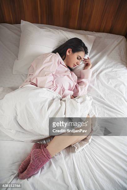194 Sleeping With Pillow Between Legs Stock Photos, High-Res Pictures, and  Images - Getty Images