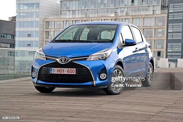 toyota yaris on the street - toyota stock pictures, royalty-free photos & images