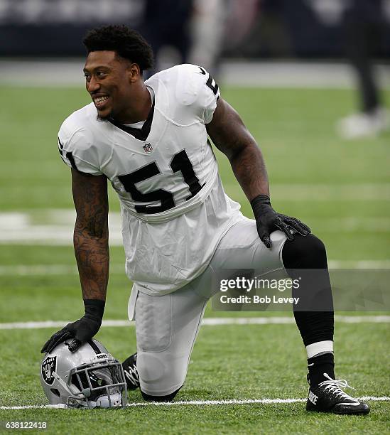 Bruce Irvin of the Oakland Raiders warms up on the field prior to the AFC Wild Card game against the Houston Texans at NRG Stadium on January 7, 2017...