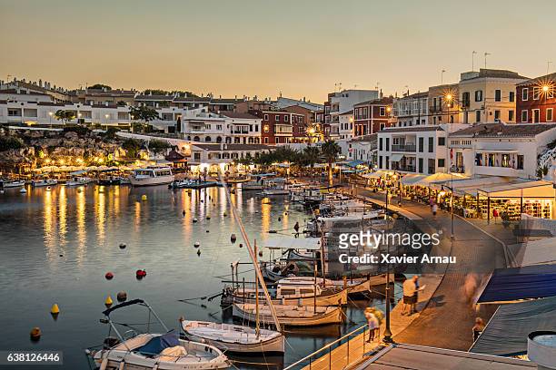 es castells town in menorca - restaurant night stock pictures, royalty-free photos & images