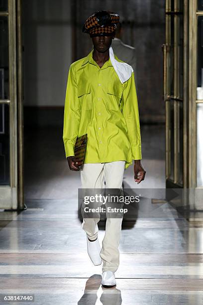 Model walks the runway at the Wales Bonner show during London Fashion Week Men's January 2017 collections at BFC Show Space on January 8, 2017 in...