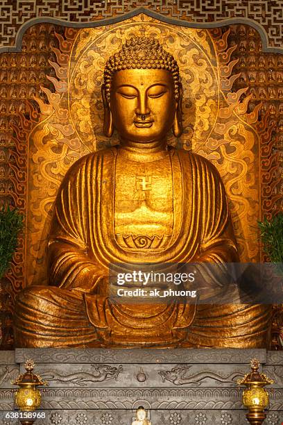 buddha statue - buddha stock-fotos und bilder