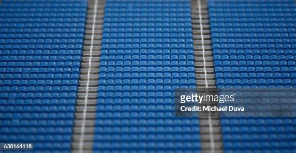 stadium seats in a stadium with stairs and railings - empty bleachers foto e immagini stock