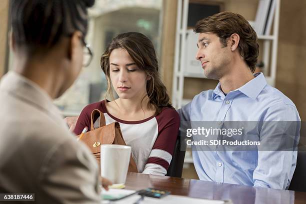 concerned dad meets with daughter's principal - embarrased dad stockfoto's en -beelden