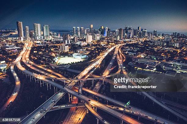 miami downtown aerial view in the night - miami stock pictures, royalty-free photos & images