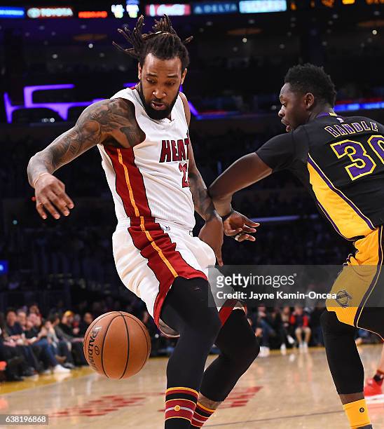Julius Randle of the Los Angeles Lakers guards Derrick Williams of the Miami Heat as he drives to the basket in the first half of the game at Staples...