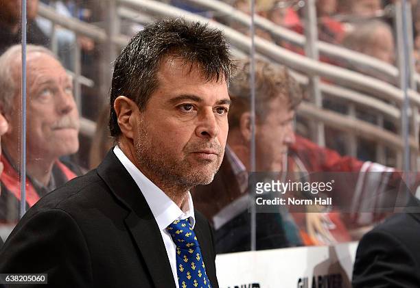 Head coach Jack Capuano of the New York Islanders looks on from the bench against the Arizona Coyotes at Gila River Arena on January 7, 2017 in...