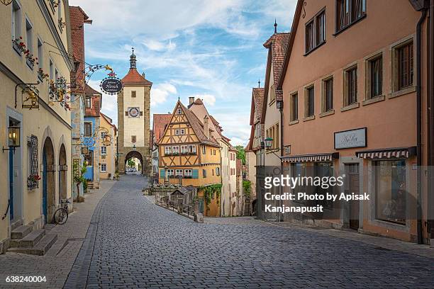 little square "plönlein" (rothenburg ob der tauber landmark) - fairytale village stock pictures, royalty-free photos & images