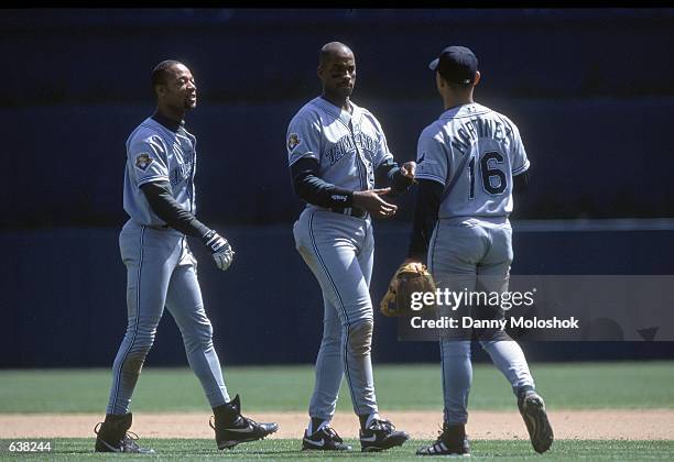 Fred McGriff, Gerald Williams, Felix Martinez of the Tampa Bay Devil Rays walk in the outfield during the game against the Detroit Tigers at Comerica...