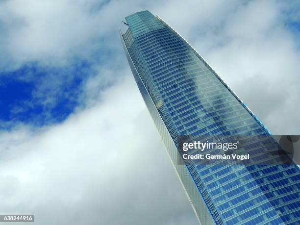 skycraper reaches the sky - tallest building in south america - santiago de chile - costanera center stock pictures, royalty-free photos & images