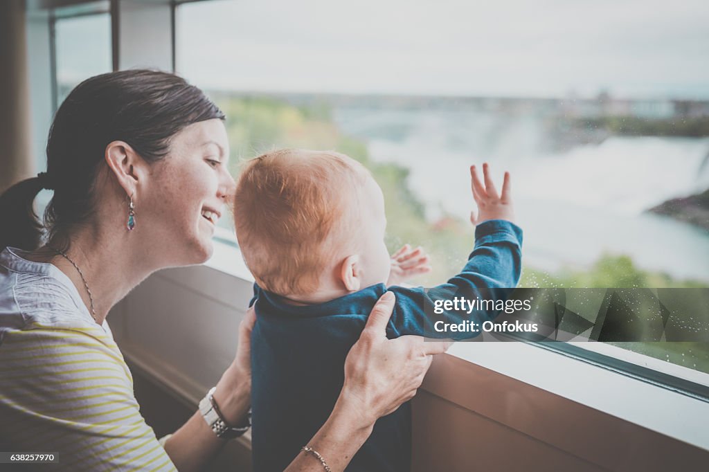 Mother and Baby Boy Looking by The Window, Niagara Falls