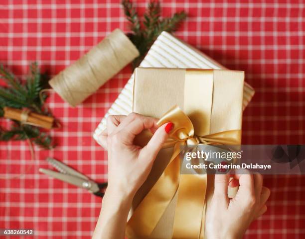 christmas still life, presents wrapping - plaid bow tie stock pictures, royalty-free photos & images