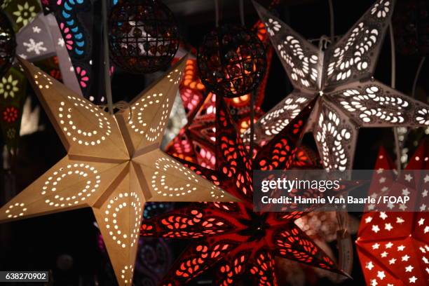 star shaped lanterns - hannie van baarle stock pictures, royalty-free photos & images