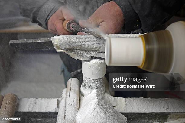 traditional craft of alabaster cutting. - ボルテラ ストックフォトと画像