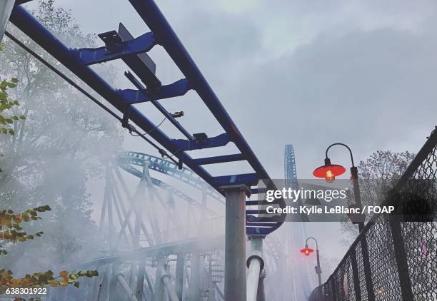 rollercoaster at foggy day - pensilvania stock pictures, royalty-free photos & images