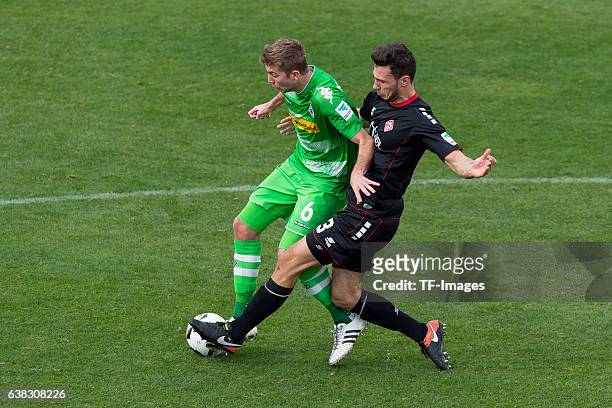 Christoph Kramer of Moenchengladbach und Patrick Weihrauch of Wuerzburger Kicker battle for the ball during the friendly match between Borussia...