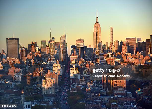 high level view of 6th avenue in manhattan, new york at dusk - sixth avenue bildbanksfoton och bilder