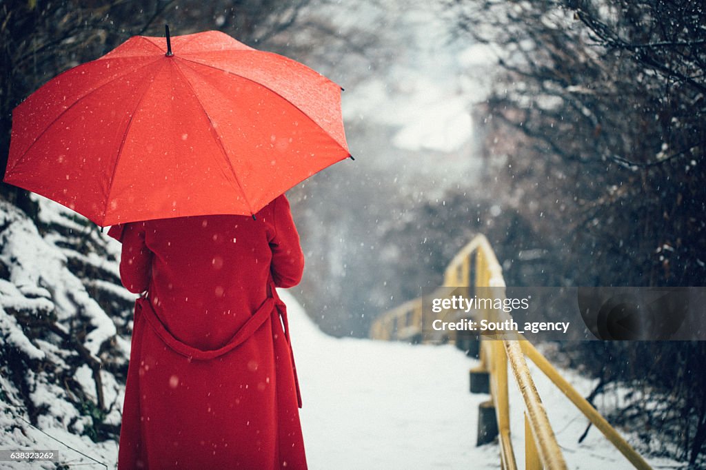 Woman in red coat