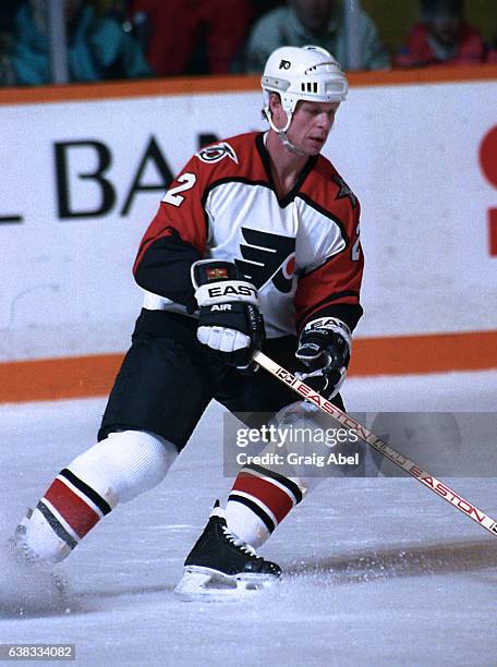 Mark Howe of the Philadelphia Flyers turns up ice against the Toronto Maple Leafs during game action on January 25, 1992 at Maple Leaf Gardens in...