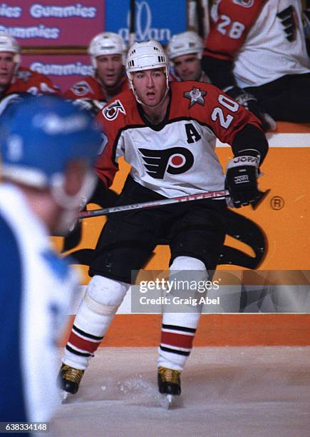 Kevin Dineen of the Philadelphia Flyers turns up ice against the Toronto Maple Leafs during game action on January 25, 1992 at Maple Leaf Gardens in...