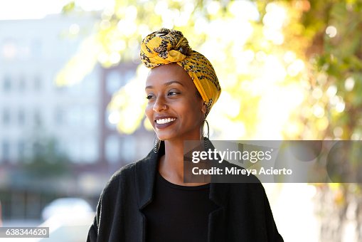 Beautiful, young, happy Muslim woman in urban setting