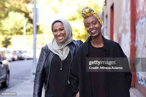 two young muslim women enjoying life - head scarf stock pictures, royalty-free photos & images