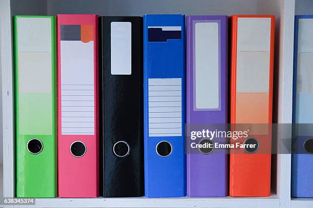 brightly coloured folders - lever arch stock pictures, royalty-free photos & images