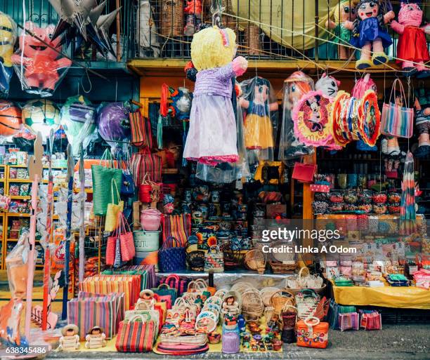 market stall filled with colorful items - mexico market stock pictures, royalty-free photos & images