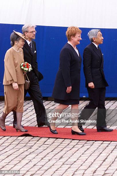 Emperor Akihito of Japan, Finland President Tarja Halonen, her husband Pentti Arajarvi and Empress Michikoof Japan attend the welcome ceremony at...