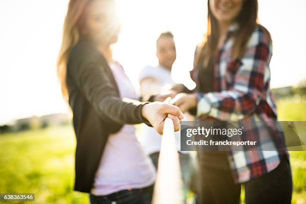 Friends Rope Pull Rope Pulling Game Photos and Premium High Res Pictures - Getty Images
